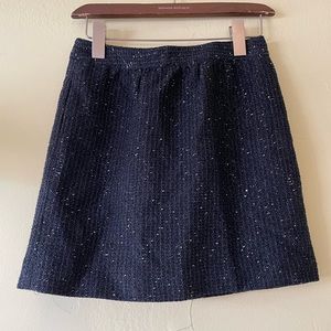 Loft 00P black festive mini skirt! Lined, front pockets! Goes with everything!